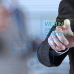 businessman hand show webinar online as concept